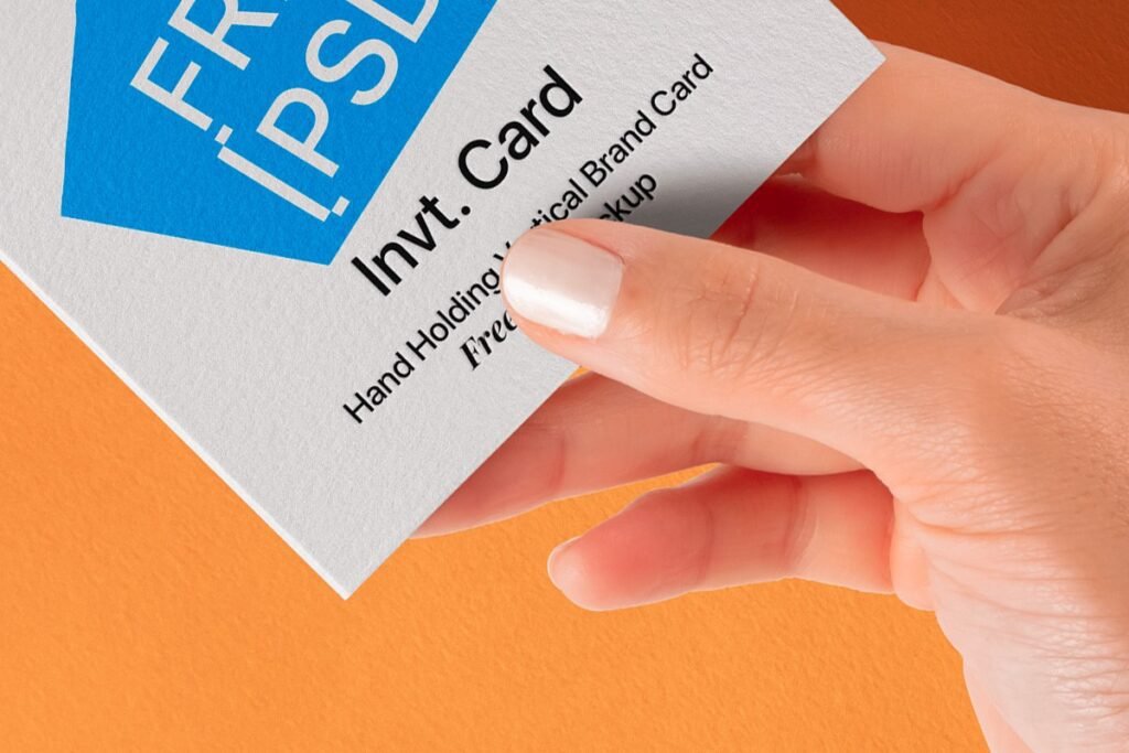 Hand Holding Vertical Brand Card Free Mockup