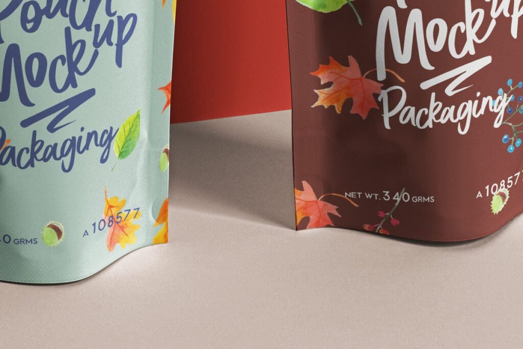 Two stand-up foil pouch mockups, one light green and one brown, both with autumn leaf designs and "Pouch Mockup Packaging" text.