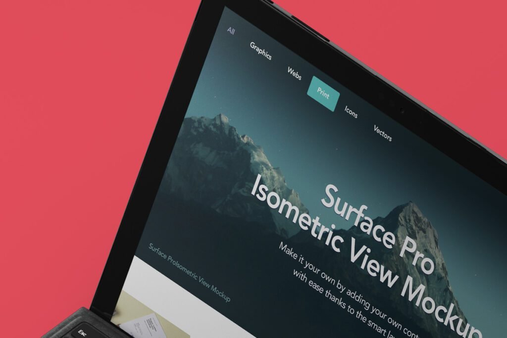 Close-up of a laptop screen displaying "Surface Pro Isometric View Mockup" over a mountainous landscape, with a red background.