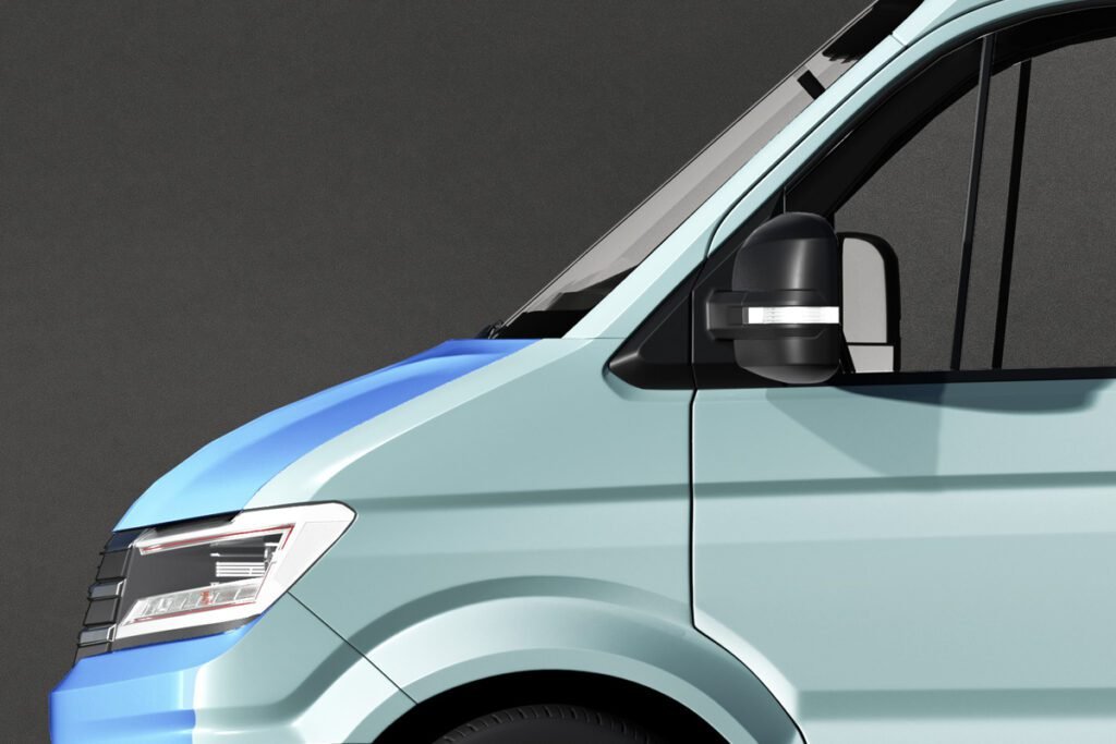 Close-up front side view of a light blue commercial van mockup with a distinctive blue stripe on the hood.