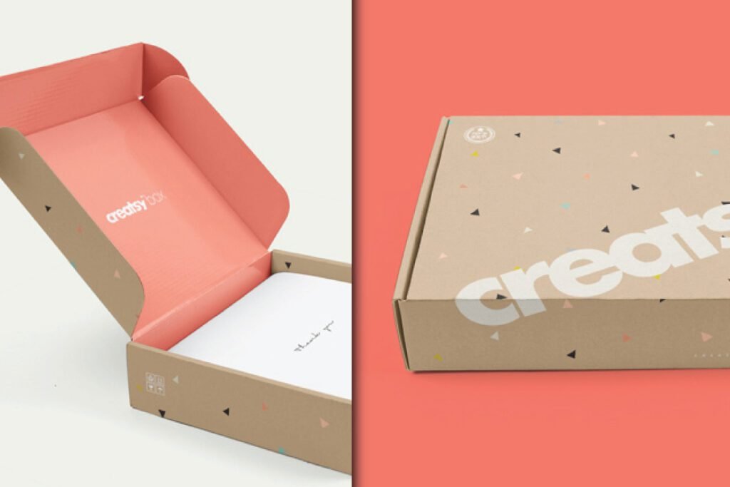 Cardboard Mailing Box Packaging and Label Mockup PSD showing two views of a brown box; one is open with a thank you card inside, and the other is closed, displaying an abstract triangle pattern.