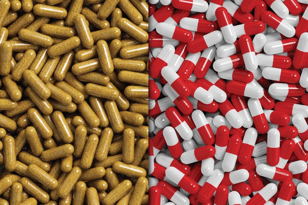 Pharmaceutical capsule and tablet mockup PSD showing two columns of different pills. The left column contains elongated yellow capsules, while the right column has red and white capsules.