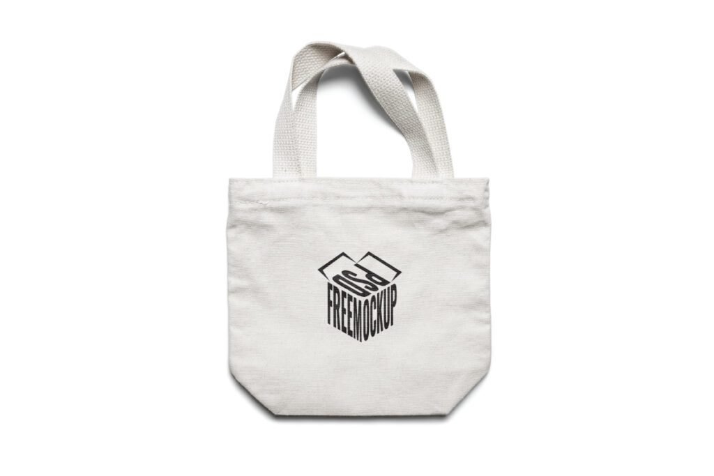 Small White Fabric Tote Bag Mockup PSD showing a single white fabric tote bag with a black PSD FREEMOCKUP logo.