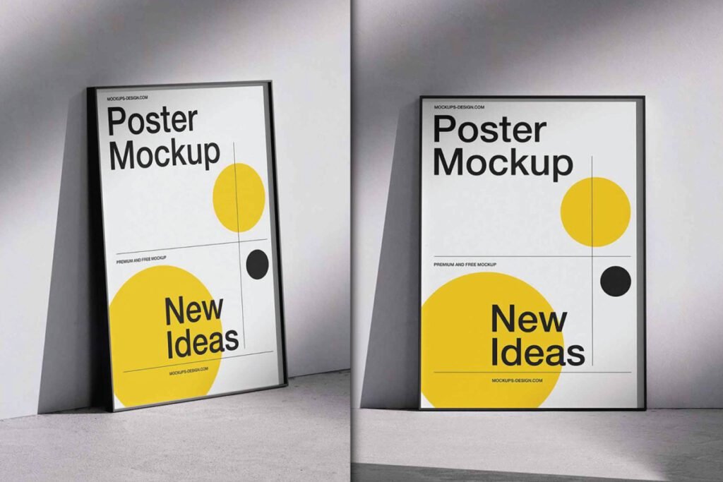 Two identical Poster Frame Mockups, each showing a white poster with "Poster Mockup" and "New Ideas" in black text, accented by large yellow circles and small black dots. Both framed posters lean against a grey wall, with the left one at an angle and the right one straight on.