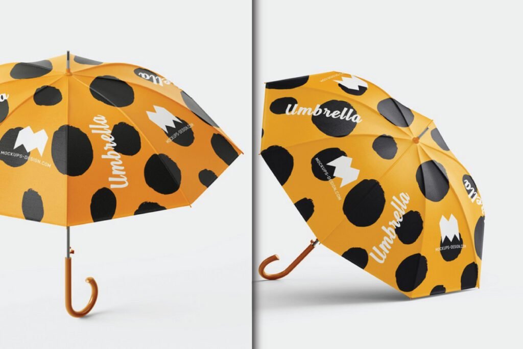 Two views of an open yellow umbrella mockup psd with black spots and white Umbrella text, showing its design from different angles.