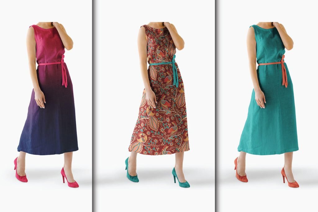 Three women wearing sleeveless dresses one with an ombre pattern one with a floral pattern and one solid colored dress.
