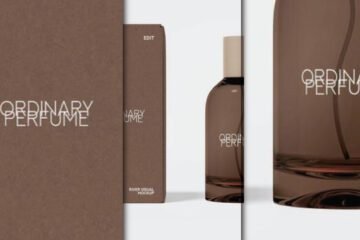 A close-up, split view of a dark amber perfume bottle mockup and its matching brown packaging box, both featuring "ORDINARY PERFUME" branding.