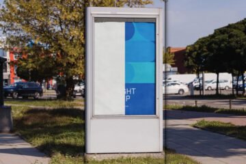 Citylight Poster Mockup in Parking Lot PSD, showing a tall, rectangular display against a backdrop of parked cars and trees.