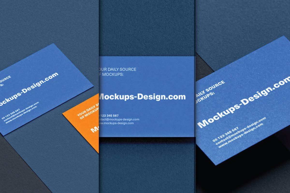 Three realistic horizontal business card mockup PSD on textured paper, featuring blue and orange cards with text about Mockups-Design.com and contact information.
