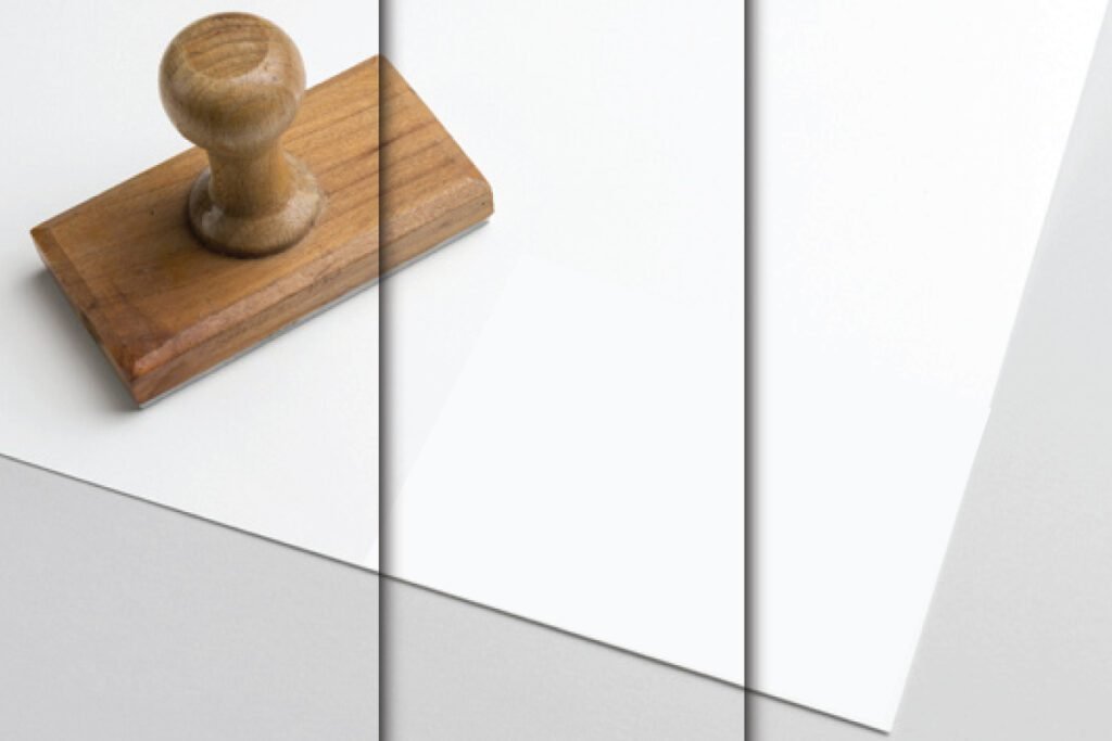Best Rubber Stamp Mockup PSD on White Texture, featuring a wooden handled rubber stamp resting on a white paper surface with subtle texture.