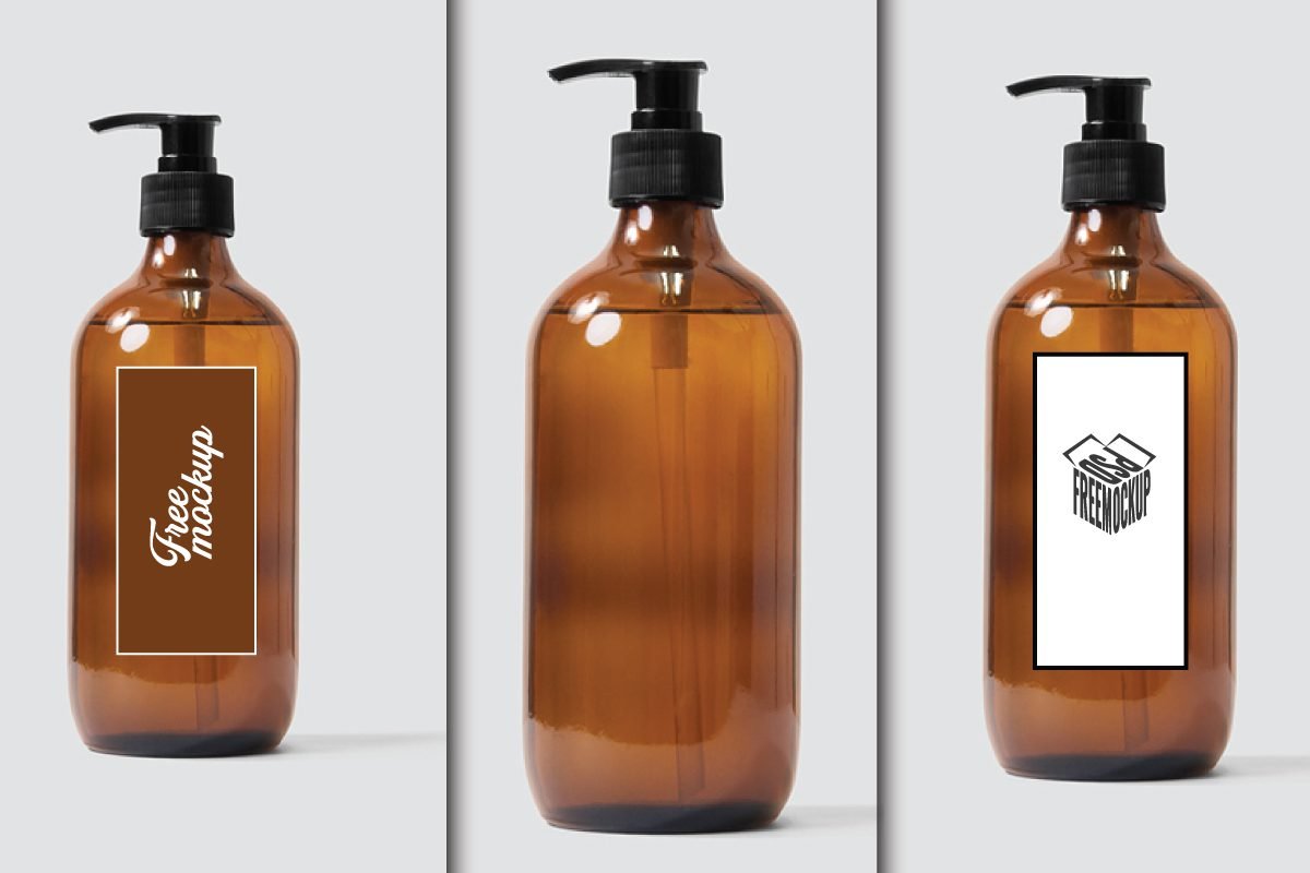 Amber Glass Dispenser Bottle Label Mockup PSD displaying three views of an amber glass bottle with a black pump. One has a brown label with white Free mockup text, one is blank, and one has a white label with a black PSD FREEMOCKUP box logo.