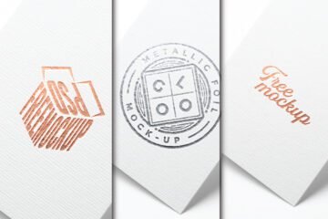 Metallic Foil Logo Mockup PSD featuring three different metallic foil effects on white textured paper. One has a rose gold 3D box logo, another a silver Metallic Foil Mockup stamp, and the third a rose gold Free mockup text.