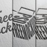 Paper Edition Logo Mockup PSD featuring three different paper textures with embossed designs. One has a dark gray Free mockup text. Another has a 3D box shape with PSD FREEMOCKUP. The third shows a subtle embossed logo with horizontal lines.