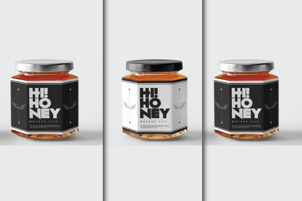 A set of three hexagonal Honey Jar Mockups, each featuring a black and white "Hi! Honey" label. The jars are filled with amber-colored liquid and have metallic or black lids, presented against a clean white background.
