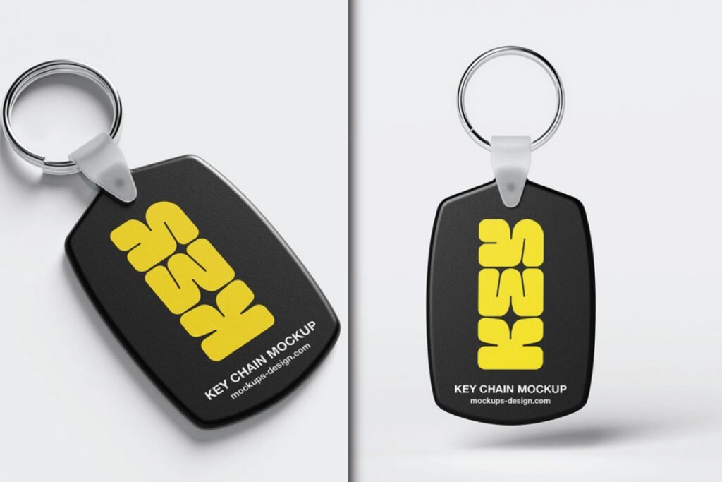 A black plastic key chain with rounded corners, featuring a yellow KSS logo, showcased in a Plastic Key Chain with Rounded Corner Mockup PSD.