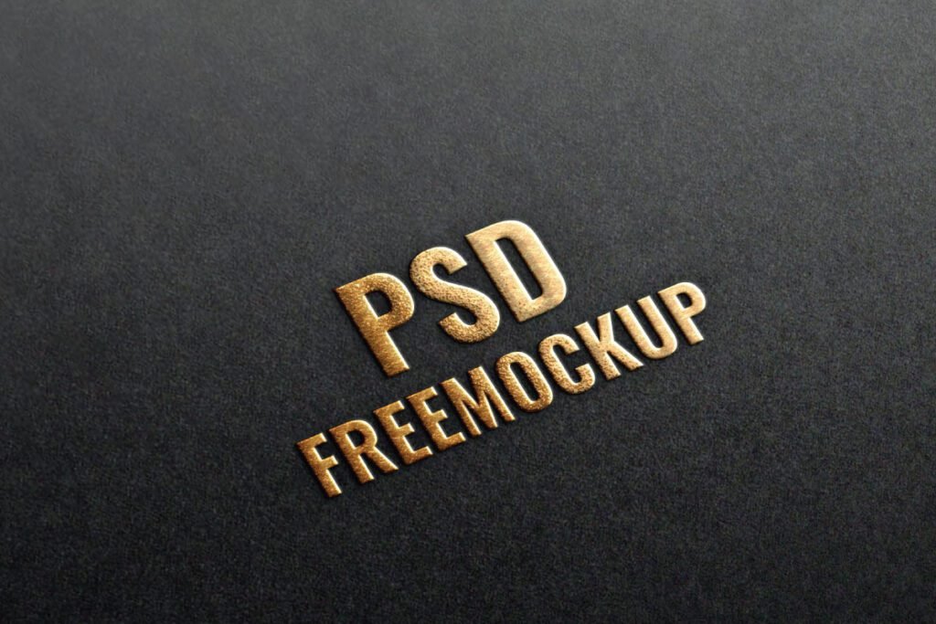 A Luxury golden texture logo on black paper mockup shows the embossed, flat text PSD FREEMOCKUP. The logo has a rough, golden finish and is set against a textured black paper background.